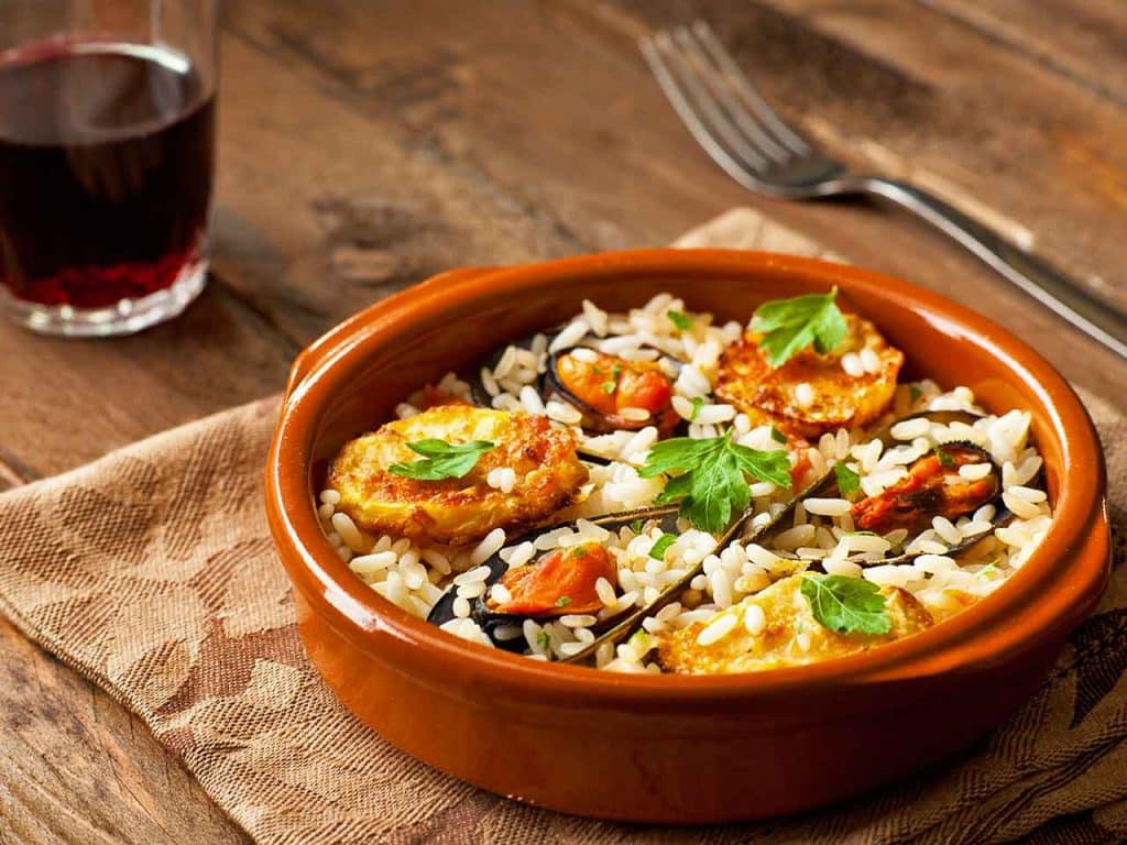 Riso, patate e cozze, uno dei piatti tipici pugliesi da non perdere secondo il PLEINAIRCLUB.